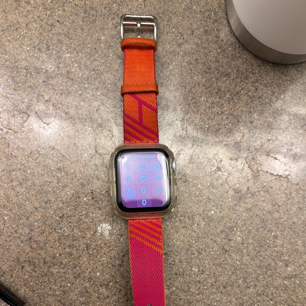 Hermes Apple Watch Single Tour 41 mm Twill Jump band in orange and pink